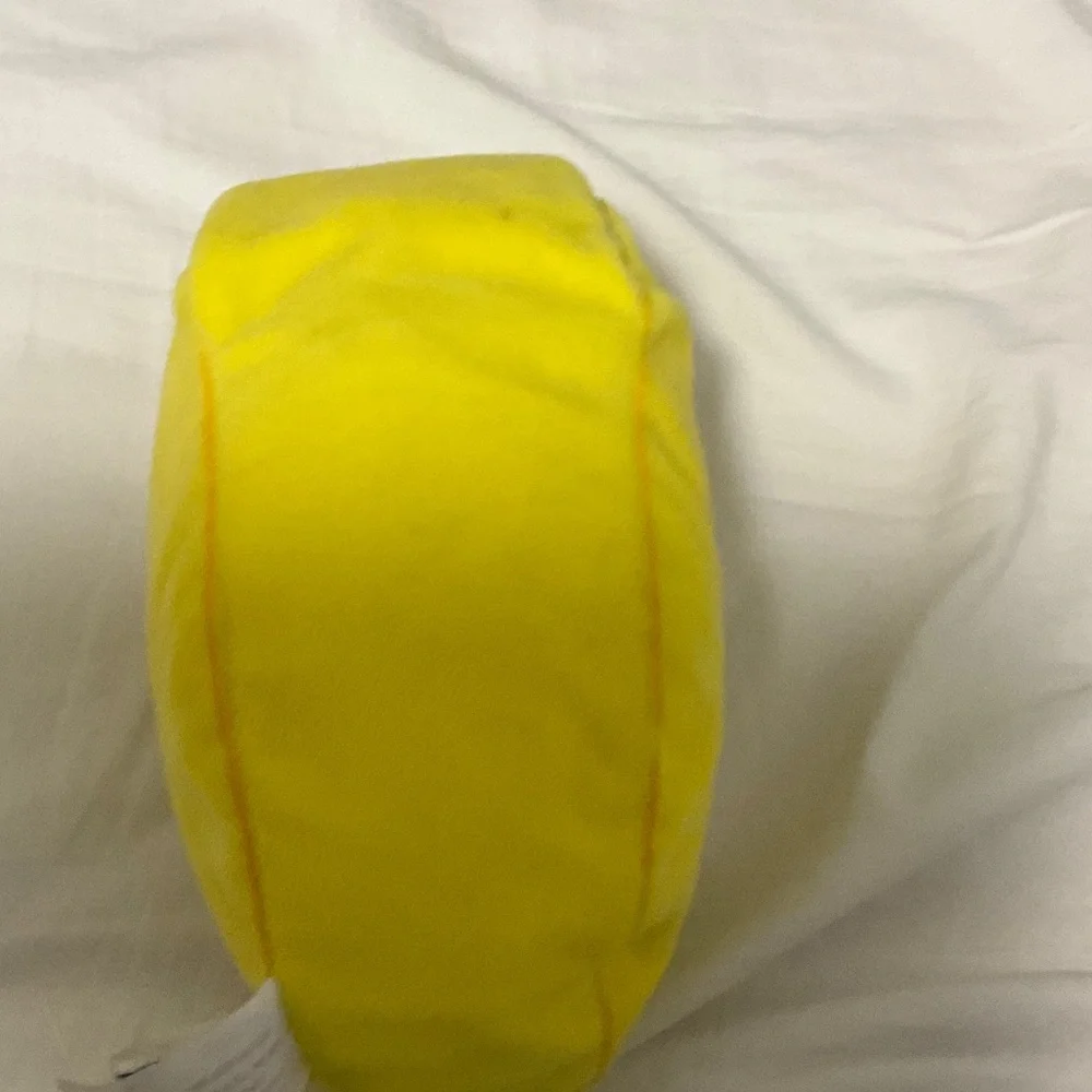Open and close Velcro banana cat stuffy.